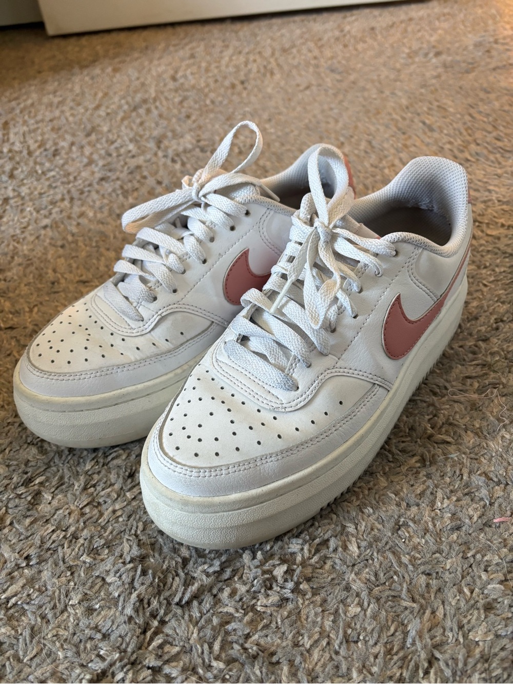 Nike Women’s White Sneakers with Rose Swoosh